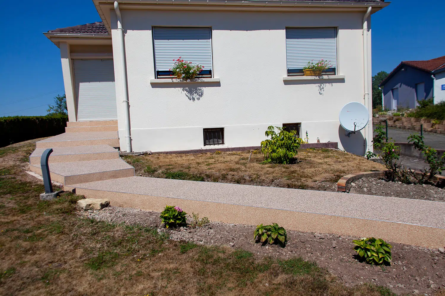 Projet de rénovation extérieure Home Résine allée de jardin